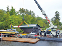 Our sectional barge and crane can reach sites with little or no shoreline