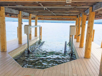 Our boat lifts are adaptable to boathouses for use with permanent docks