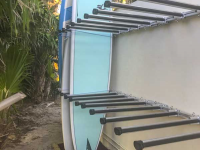 Custom vertical rack with additional support arms for multiple paddleboard storage