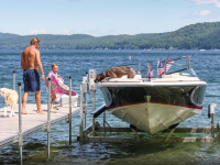 Adding a boat lift to your dock system will protect your boat and dock from damage.