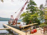 One of our crews installing a commercial pile dock at a homeowners association