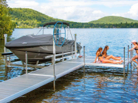 Standard duty aluminum docks with NyloDeck decking and 4,500 lb. vertical boat lift