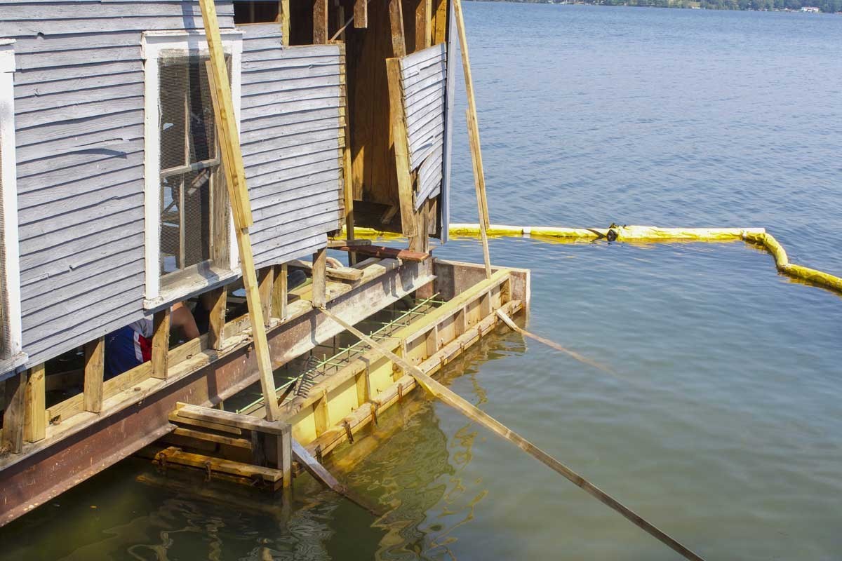 Repairs to boathouse foundation damaged by ice