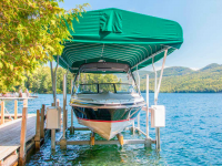 Sunbrella® canopy with straight edge and our Ultimate Boat Lift