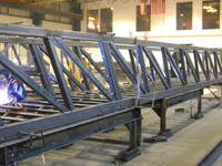 Fabrication of a 112' long industrial free span stairs in our Ferrisburgh Vermont facility