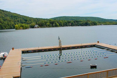 Heavy duty steel truss floating docks at a private summer resort