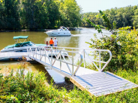 Heavy duty aluminum floating dock with our pile platform as a shore hitch