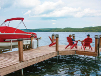 Articulating dock with Ipe decking and custom post covers on Lake George, NY