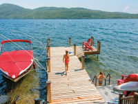 Articulating dock with Ipe decking and custom post covers on Lake George, NY