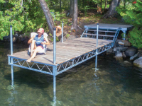 Straight articulating dock with our shoreside pile-dock platform as a shore mount