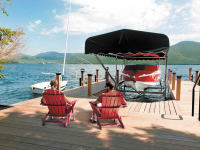 Articulating dock, vertical boat lift with Sunbrella canopy on Lake George NY