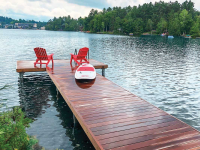 Pile dock with piles cut below the decking, Lake Placid, NY