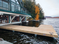 L-shaped pile dock attached to an existing boathouse, Inlet, NY