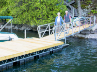 Steel gangway connected to a custom floating dock