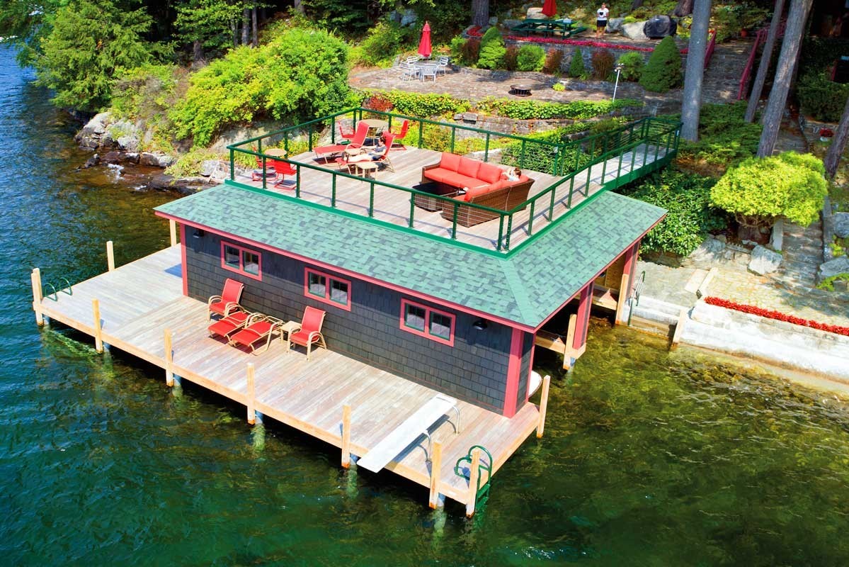 Boathouse with sundeck style roof and two boat slips