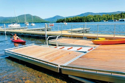 Heavy duty aluminum floating kayak launch integrated with our steel truss floating dock system