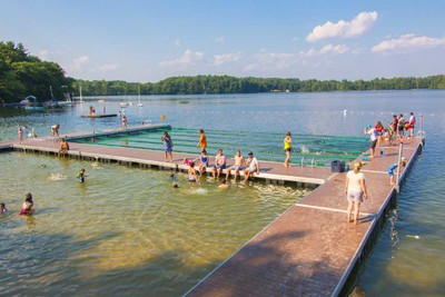 Heavy duty aluminum floating docks with composite decking and custom swim turn boards