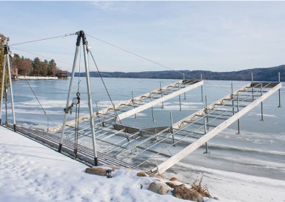 Articulating dock on Lake George raised for winter storage