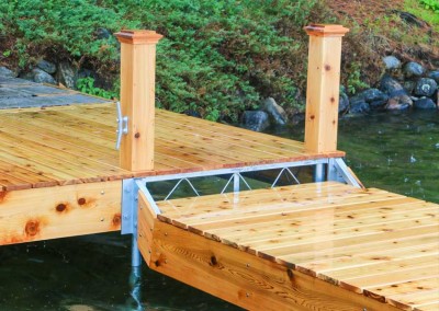 Cedar post covers and skirt boards to hide the dock frame