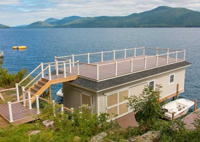 Sundeck style boathouse with stainless steel cable rails for an unobstructed view