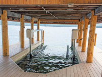 Our boat lifts are adaptable to boathouses for use with permanent docks
