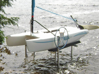 Small craft lift customized to accommodate a sailboat