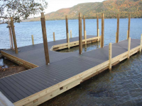 New U-shaped crib dock with Trex decking.  The upright supports are in place for construction of a future sundeck, Sabbath Day Point, Lake George, NY