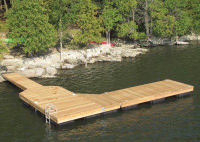 Floating dock with skirt boards to cover the truss frame