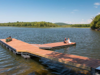 Steel truss floating dock with Ipe decking and aluminum frame 