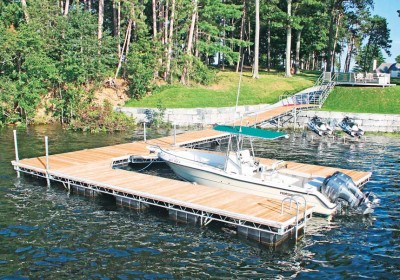Steel truss floating dock and curved shoreside pile platform with our custom stairs and walkway to the dock