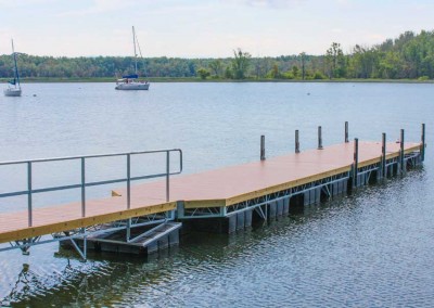 Galvanized steel truss floating dock with vertical fenders