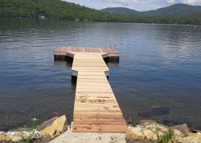 Floating dock with skirt boards to hide the truss frame