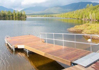 T-shaped floating dock with Ipe decking & truss skirt board.