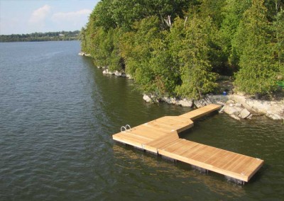 L-shaped custom floating dock with Garapa hardwood decking