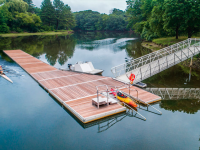 This launch dock with ADA platform is integrated into our aluminum rowing dock with aluminum gangway.