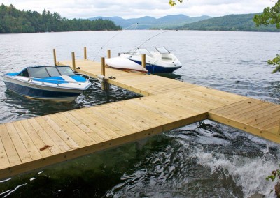 Pile dock with optional mooring whips & rub strakes to protect the boats
