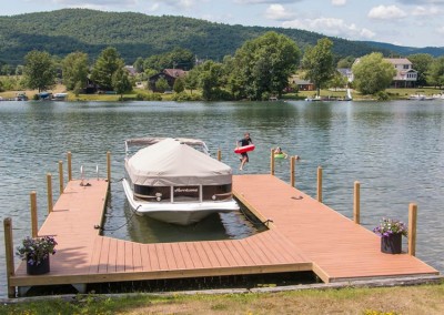 U-shaped pile dock with composite decking and pilings cut below the decking - Ticonderoga, NY