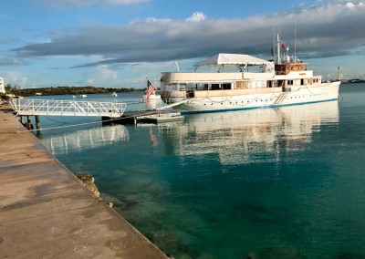 Floating aluminum dock and gangway for boarding of a yacht at the Rosewood Hotel, Bermuda