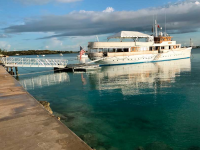 Heavy duty aluminum dock and gangway for boarding of a yacht at the Rosewood Hotel, Bermuda