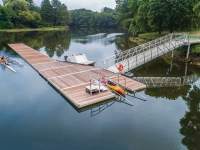 Our aluminum frame rowing dock with aluminum gangway and our commercial kayak launch with ADA transfer platform. Our pile dock serves as a shore hitch.