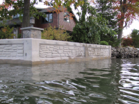 Concrete seawall refacing using decorative form liners