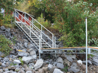 Aluminum beach stairs connected to our heavy duty steel truss leg dock