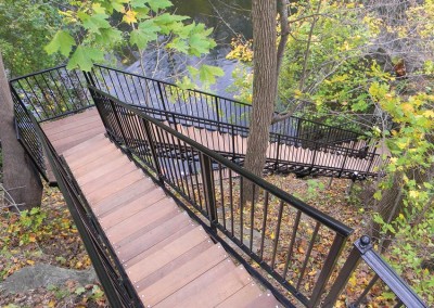 Freespan stairs with black powder coating and Ipe treads - these stairs traverse a vertical drop of 60 feet