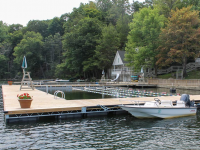 Floating summer camp docks with turn boards and lane line attachments