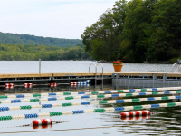 Floating summer camp docks with custom turn boards and connections for lane lines