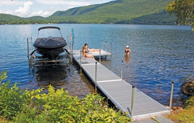 Standard duty leg docks with NyloDeck decking, swim stairs and vertical boat lift