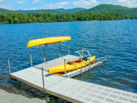 Standard duty aluminum leg dock with Sure-Step® decking and our freestanding launch port system