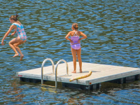 8' x 8' aluminum swim raft with composite decking and 3' aluminum ladder