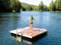 Aluminum swim raft with cedar decking