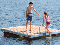 Aluminum swim raft with cedar decking and aluminum ladder